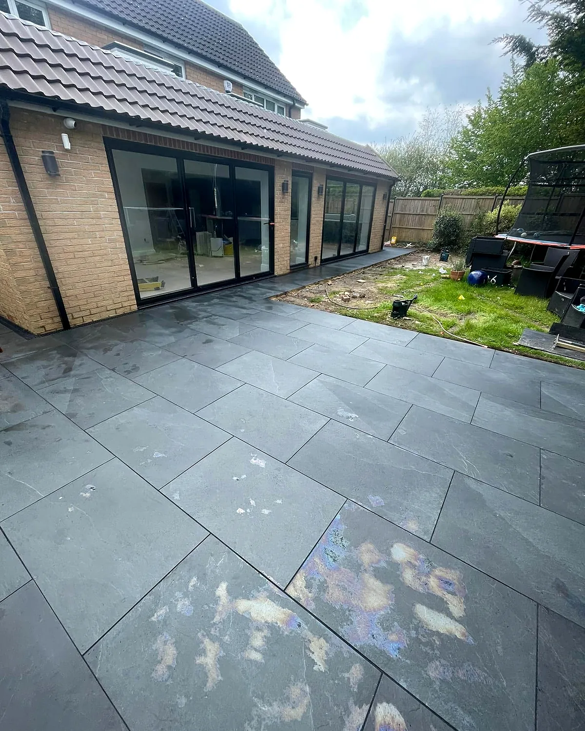 Large rear extension with wrap-around porcelain paving