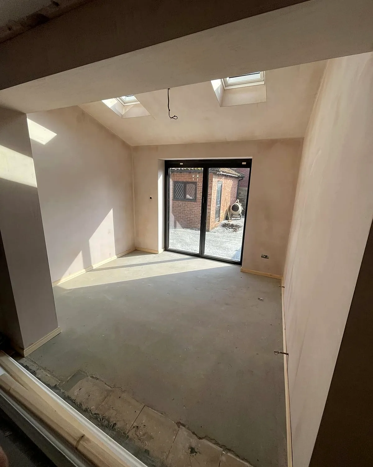 Inside the rear extension, plastered
