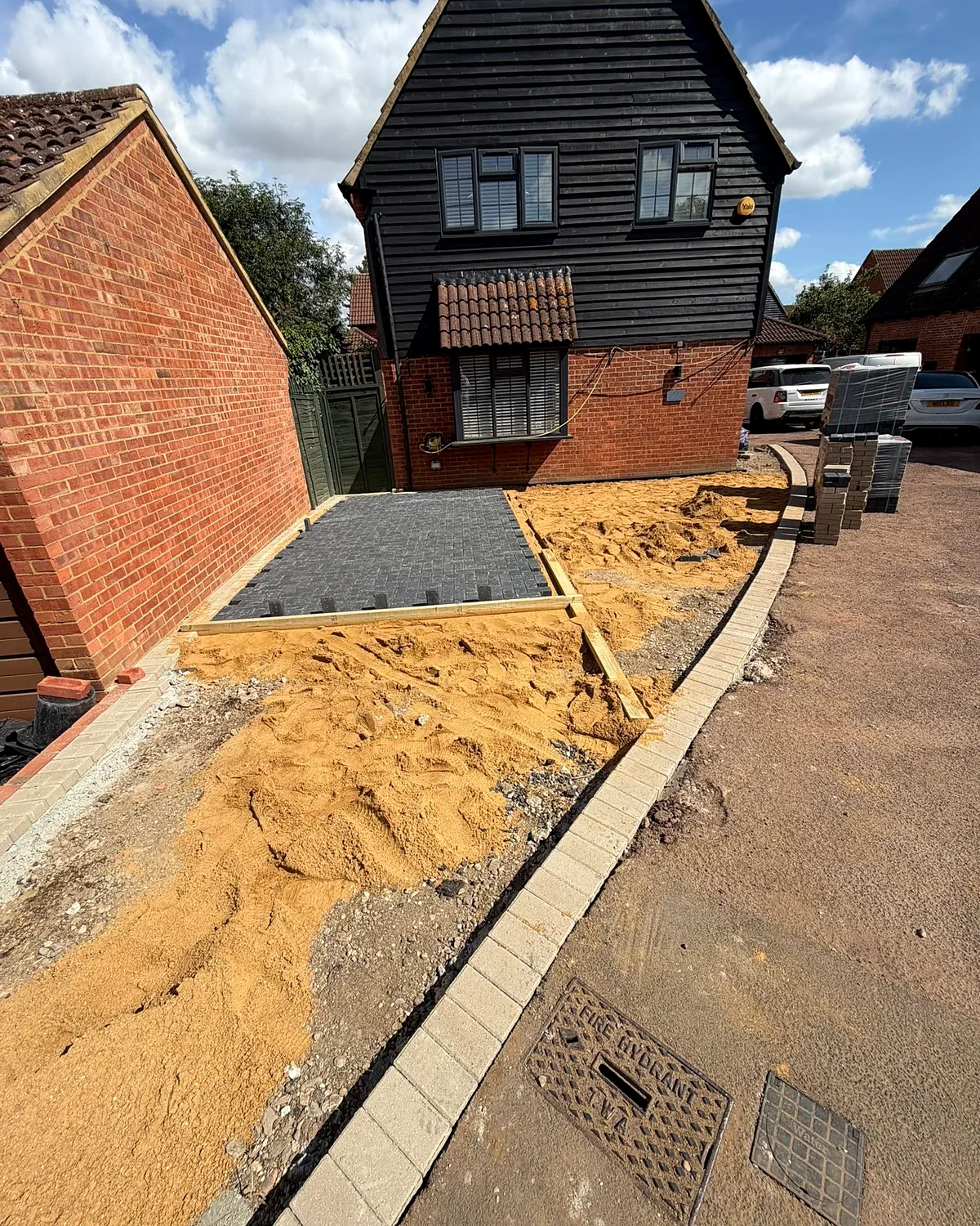 Before: sand bed and kerbs set
