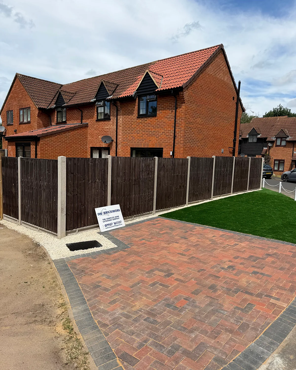 Block paving and lawn at the front
